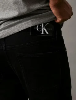 SLIM TAPER - Slim jeans
